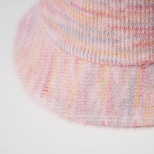 Detailed macro view of colorful fuzzy mohair knit texture on this warm winter bucket hat