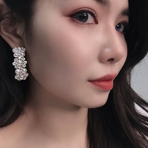 Elegant C-shaped pearl and rhinestone hoop earrings for women with baroque vintage aesthetic