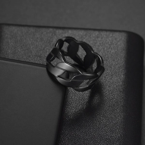 Macro shot of 9mm black stainless steel chain link ring with a matte punk finish