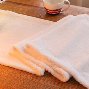 White faux fur table runner for minimalist winter holiday and Christmas home decor style