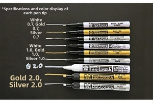 Detailed strokes of white gold and silver paint pens in 0.7mm 1.0mm and 2.0mm nib sizes