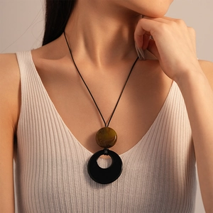 Bohemian retro resin round pendant necklace with black cord for modern women