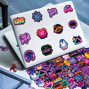 Waterproof neon vinyl stickers on laptop showing colorful aesthetic and high saturation