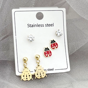 Three-pair stainless steel earring set featuring zircon studs and ladybug designs