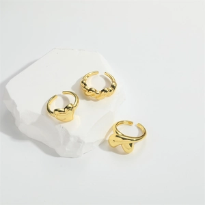 Three-piece set of 14K gold plated water drop, heart, and twisted open rings for women