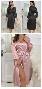 Detail view of pink and black long sleeve satin robes with waist tie and V-neckline