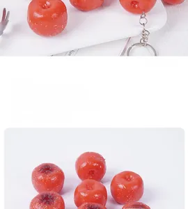 Macro shot of realistic deep red PVC hawthorn model with lifelike speckled texture