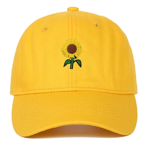 Yellow baseball cap with sunflower embroidery and curved brim for outdoor sun protection