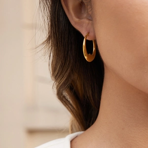 Polished gold crescent hoop earrings for women made of durable stainless steel