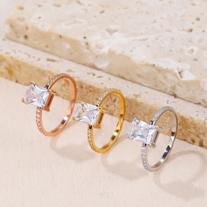 Retro square zirconia rings set in rose gold, gold and silver finish on marble
