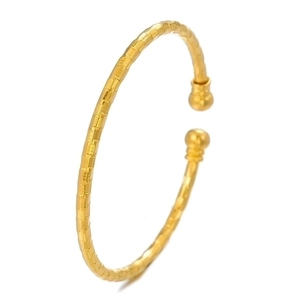 Elegant gold-plated open cuff bracelet with cubic zirconia beads and square texture
