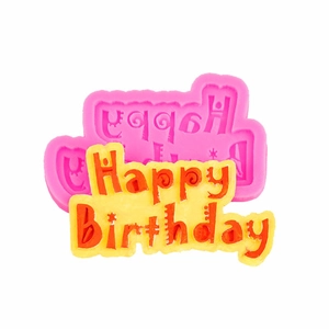 Pink silicone Happy Birthday cake topper mold with yellow fondant lettering sample