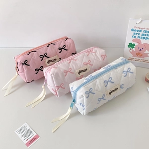 Quilted bow pencil case set in pink and white with zipper and ribbon puller detail