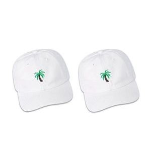 Close-up of green palm tree embroidery on a white cotton baseball cap with six-panel structure
