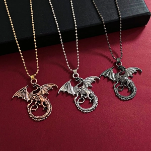 Gothic flying dragon pendant necklaces in bronze, silver and black finishes on red card