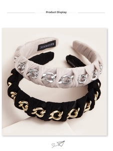 Close-up of vintage chain woven headbands in beige and black with handmade inner stamp