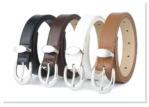 Row of four PU leather belts in black, brown, and white with silver oval buckles