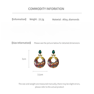 Detailed size specifications for vintage peacock feather earrings in alloy and diamond