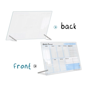 Front and back views of a clear acrylic weekly planner with metal stands on white background