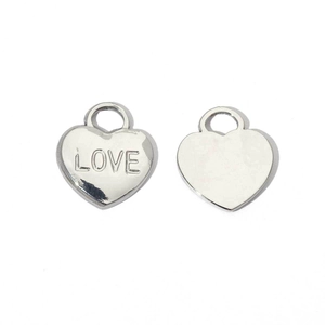 Macro detail of polished stainless steel heart charms with LOVE engraving and back view
