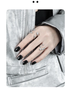 Close-up of irregular liquid metal style S925 silver open rings on a model