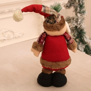 Detailed back view of a plush Christmas doll with red hat and checkered scarf decoration