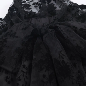 Elegant women's black mesh pleated long dress with flocked floral pattern and bow tie neckline