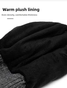Close-up of thick black fleece lining and dense knit texture for warm winter headwear