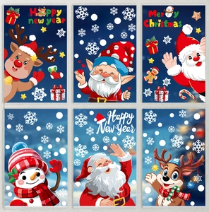 Close-up of Christmas glass window stickers featuring Santa, elk, and snowman motifs