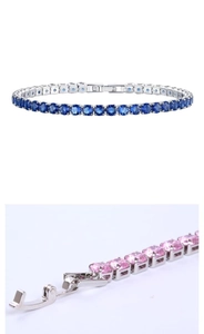 Macro view of blue and pink tennis bracelets with secure clasp and cubic zirconia stones
