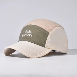 Detail of multi-color five-panel camp cap featuring mountain and Explore embroidery