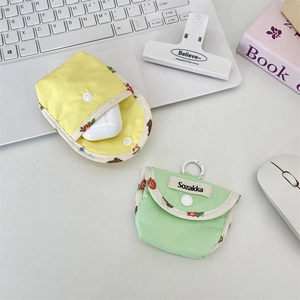 Detail of floral bear fabric headphone pouch with snap button and hanging ring