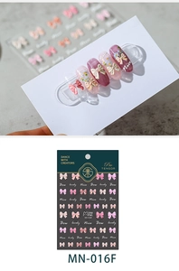 Detailed 3D embossed pink bow nail stickers with elegant butterfly patterns and letters