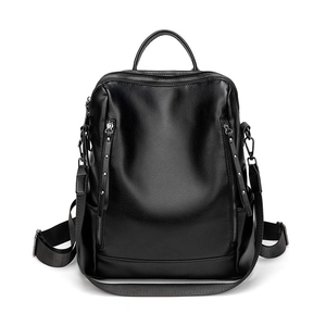 Fashionable black pebbled leather backpack with silver zippers and rivet details for women