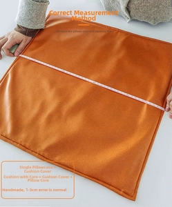 Orange faux suede cushion cover showing flat measurement method and dimensions