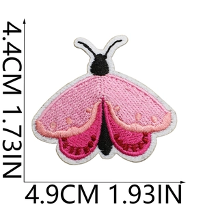 Detail of pink and black butterfly embroidery patch with size markings 4.4cm x 4.9cm