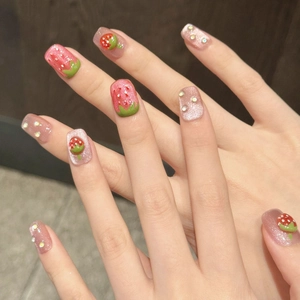 Pink glitter press-on nails with 3D handmade strawberry art and crystal accents