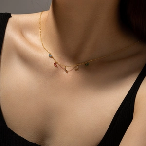 Elegant gold S925 silver necklace with multicolored leaf-shaped zirconia charms