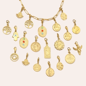 Golden stainless steel Tree of Life and Hamsa pendants set on minimalist necklace