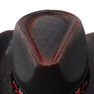 Detailed top view showing black and red gradient woven texture of a straw cowboy hat