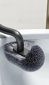 S-shaped toilet brush with high-density bristles cleaning deep inside ceramic rim