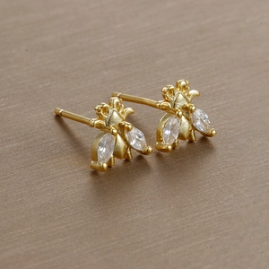 Luxurious gold-plated bee stud earrings featuring sparkling crystal marquise wings