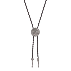 Western cowboy vintage bolo tie with antique silver floral buckle and dark brown leather cord