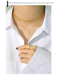 Close-up of gold beaded choker and rectangle pendant necklace with 38cm and 42cm length