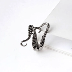 Detailed view of vintage silver octopus ring showing intricate tentacle and sucker textures