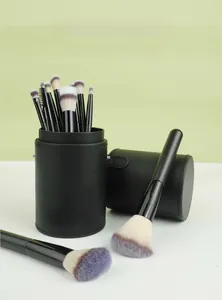 Detail of 12pcs black makeup brush set with elegant PU leather cylinder storage case