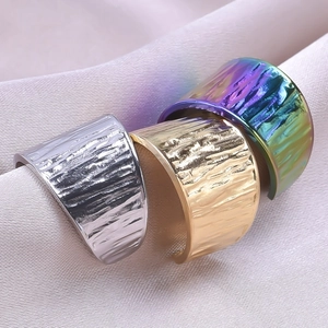 Minimalist open rings with bark texture in silver, gold, and rainbow finishes