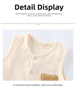 Detail of baby cotton gauze vest featuring a soft round neckline and cute teddy bear patch
