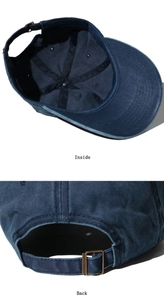Detail view of navy baseball cap showing inside stitching and adjustable metal buckle