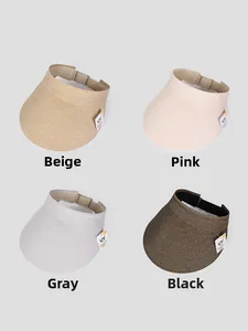 Detail view of woven sun visors in beige, pink, grey and black with UV protection